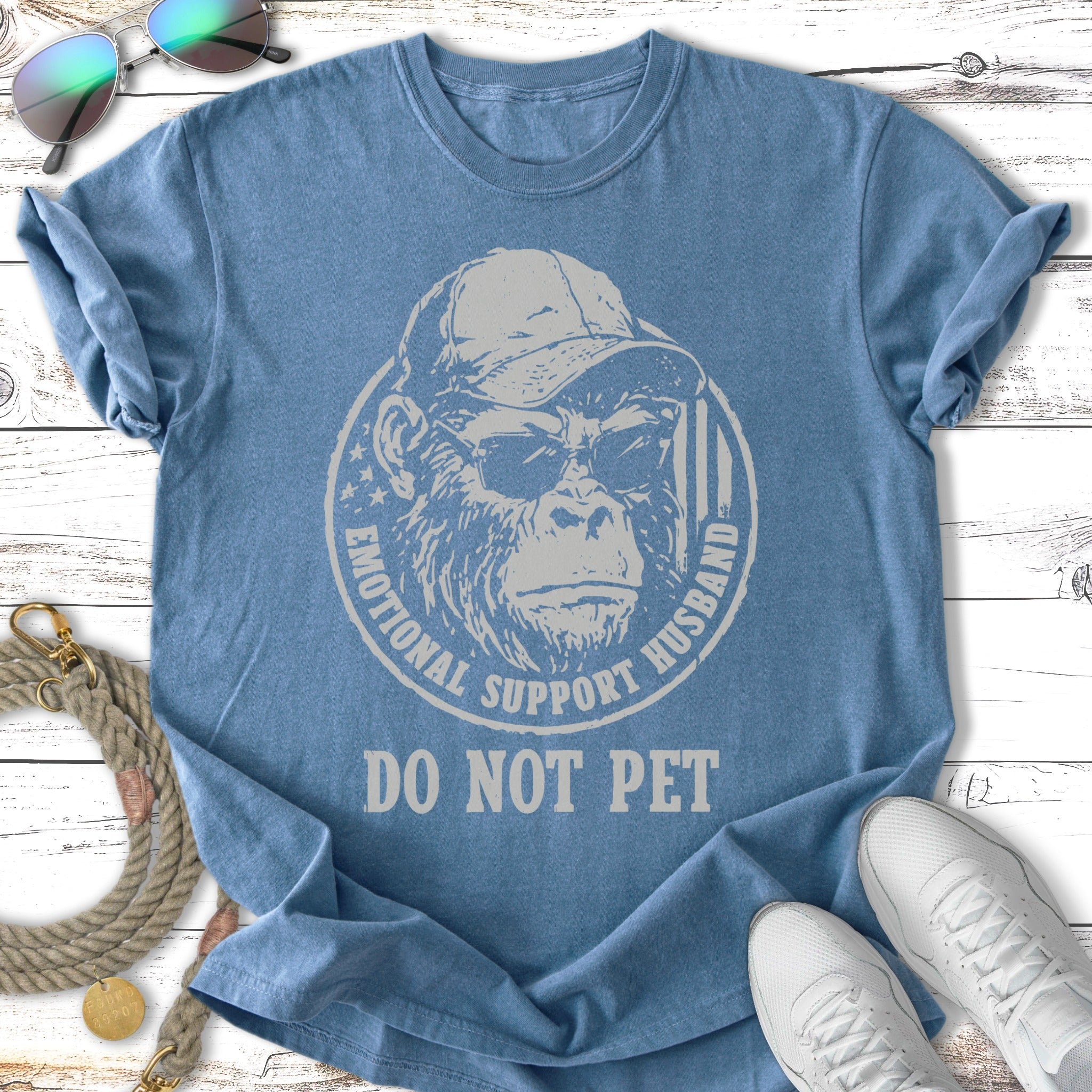 Blue t-shirt with "Emotional Support Husband" and "Do Not Pet" graphic.