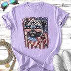 Pug wearing sunglasses and bandana with American flag design.