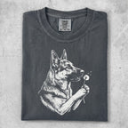 German Shepherd holding a dandelion puffball, Comfort Colors brand.