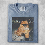 Pomeranian dog wearing sunglasses holding iced coffee.