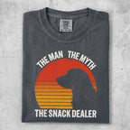 Dark grey t-shirt with "THE MAN THE MYTH THE SNACK DEALER" and dog silhouette.