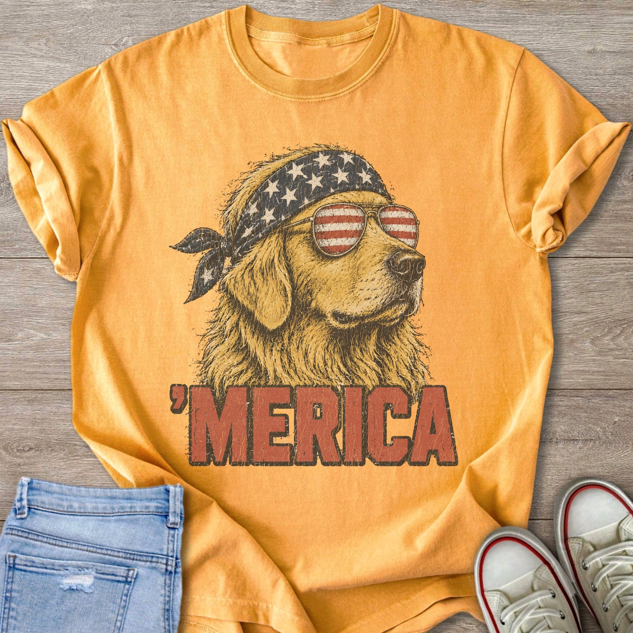 Golden retriever wearing American flag bandana and sunglasses with MERICA text.