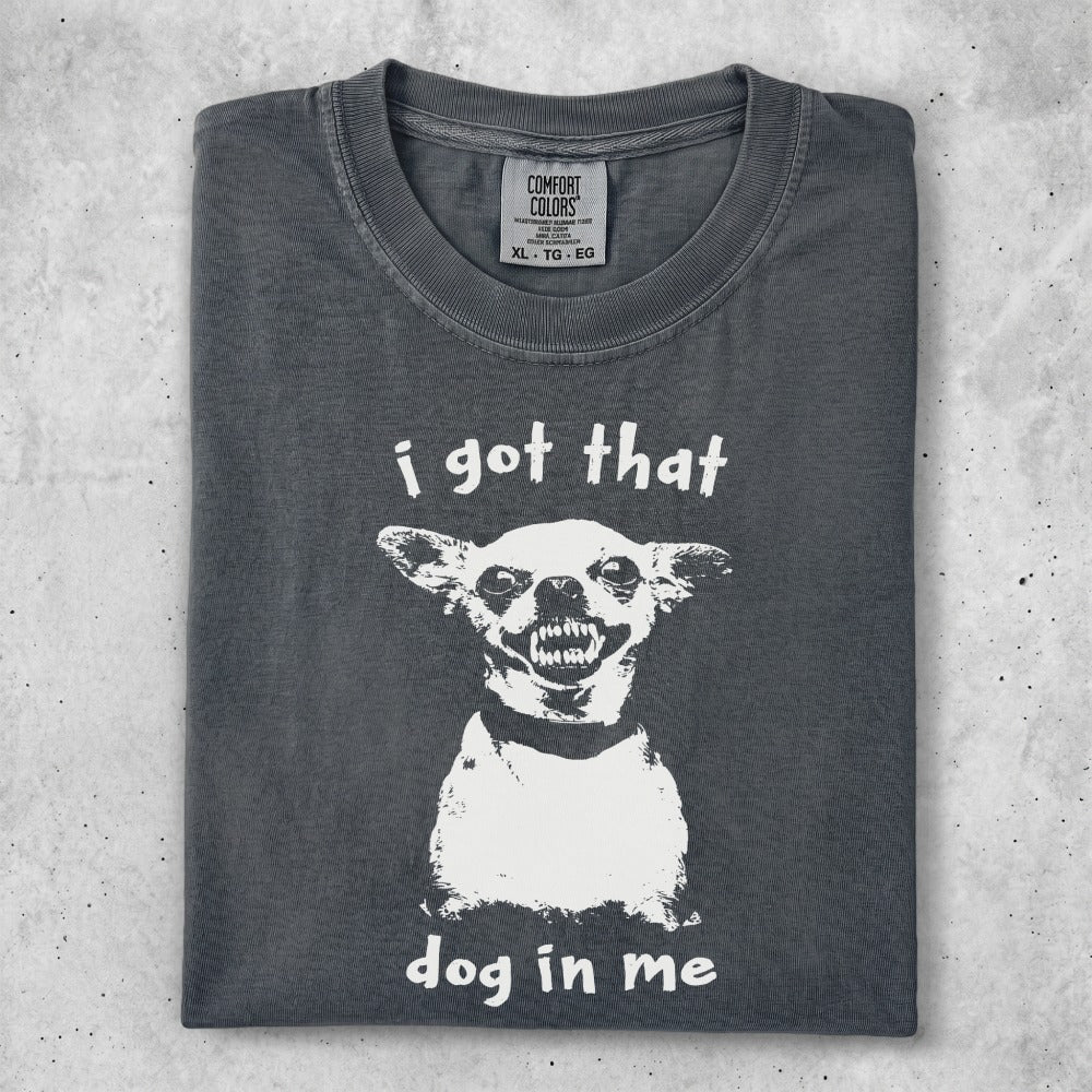 Dark grey t-shirt with "I got that dog in me" text and a grinning dog graphic.