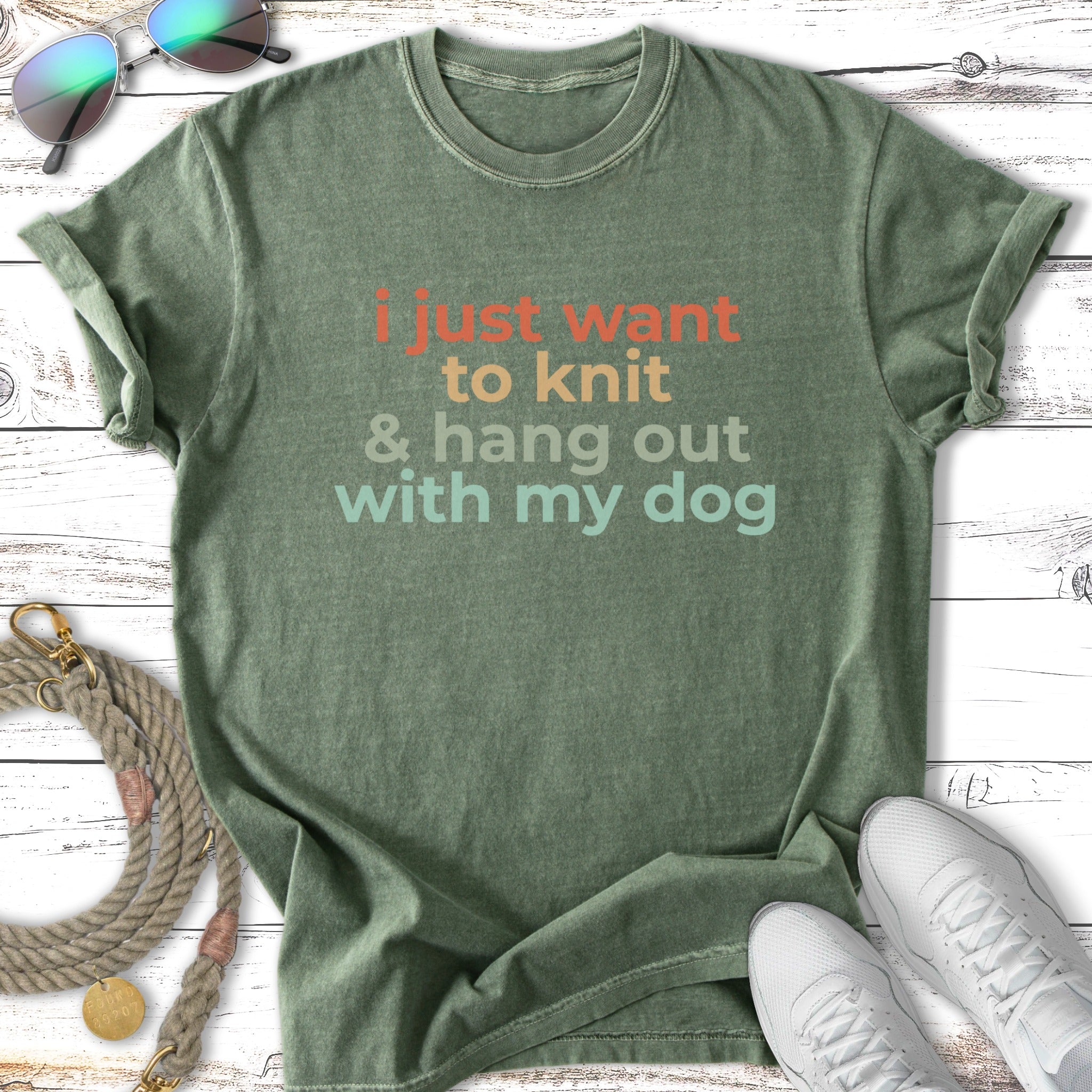 Green t-shirt with "I just want to knit & hang out with my dog" text.