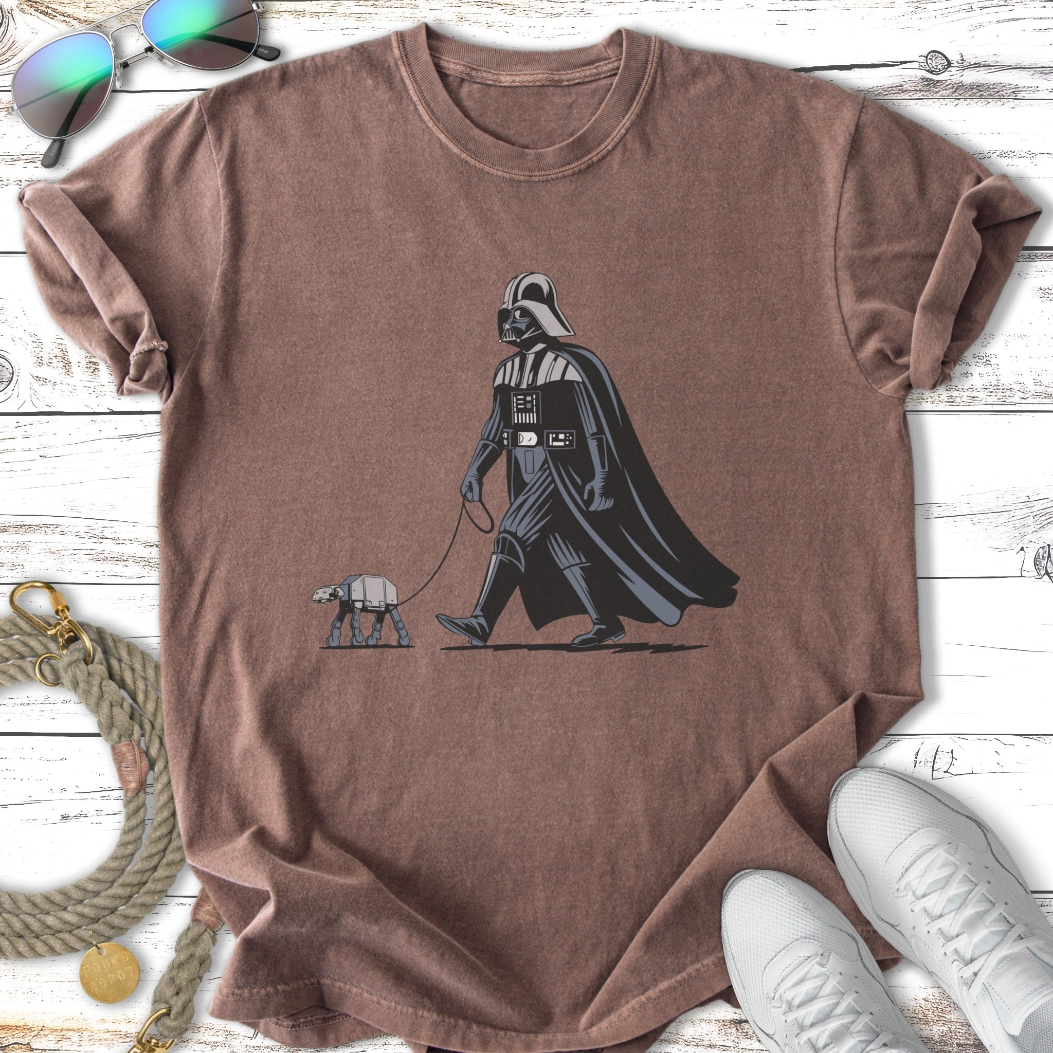 Darth Vader walking an AT-AT in a cartoon style.