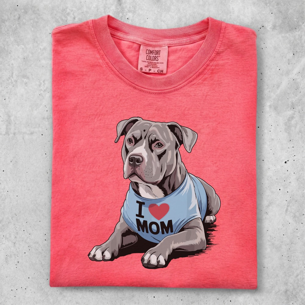 Pitbull wearing an "I Mom" shirt, cropped view.