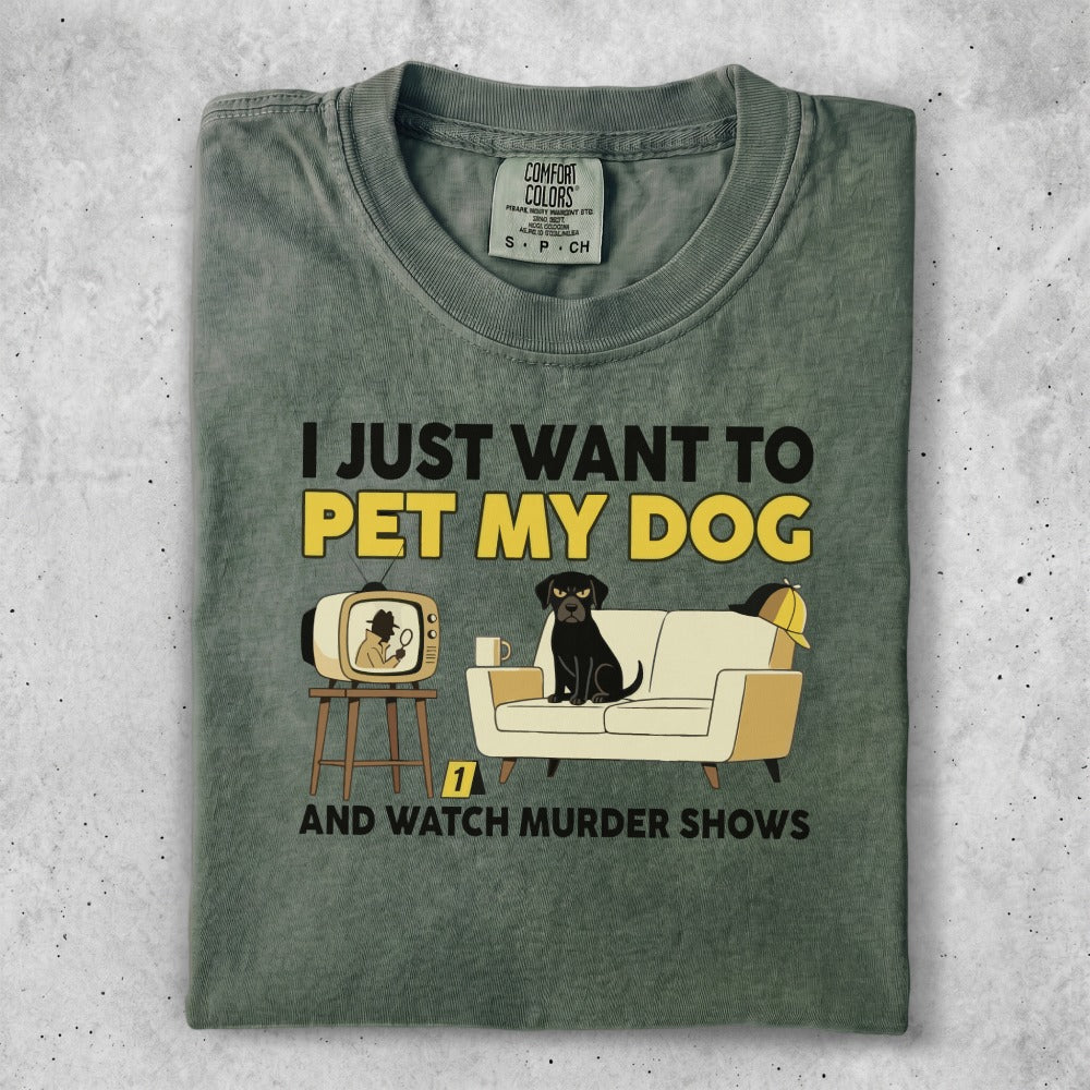 T-shirt with dog, couch, TV, and text about dogs and murder shows.