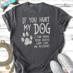 Dark t-shirt with white text and a paw print: "If you hurt my dog...".