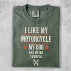 Green t-shirt with "I LIKE MY MOTORCYCLE MY DOG AND MAYBE 3 PEOPLE" text.