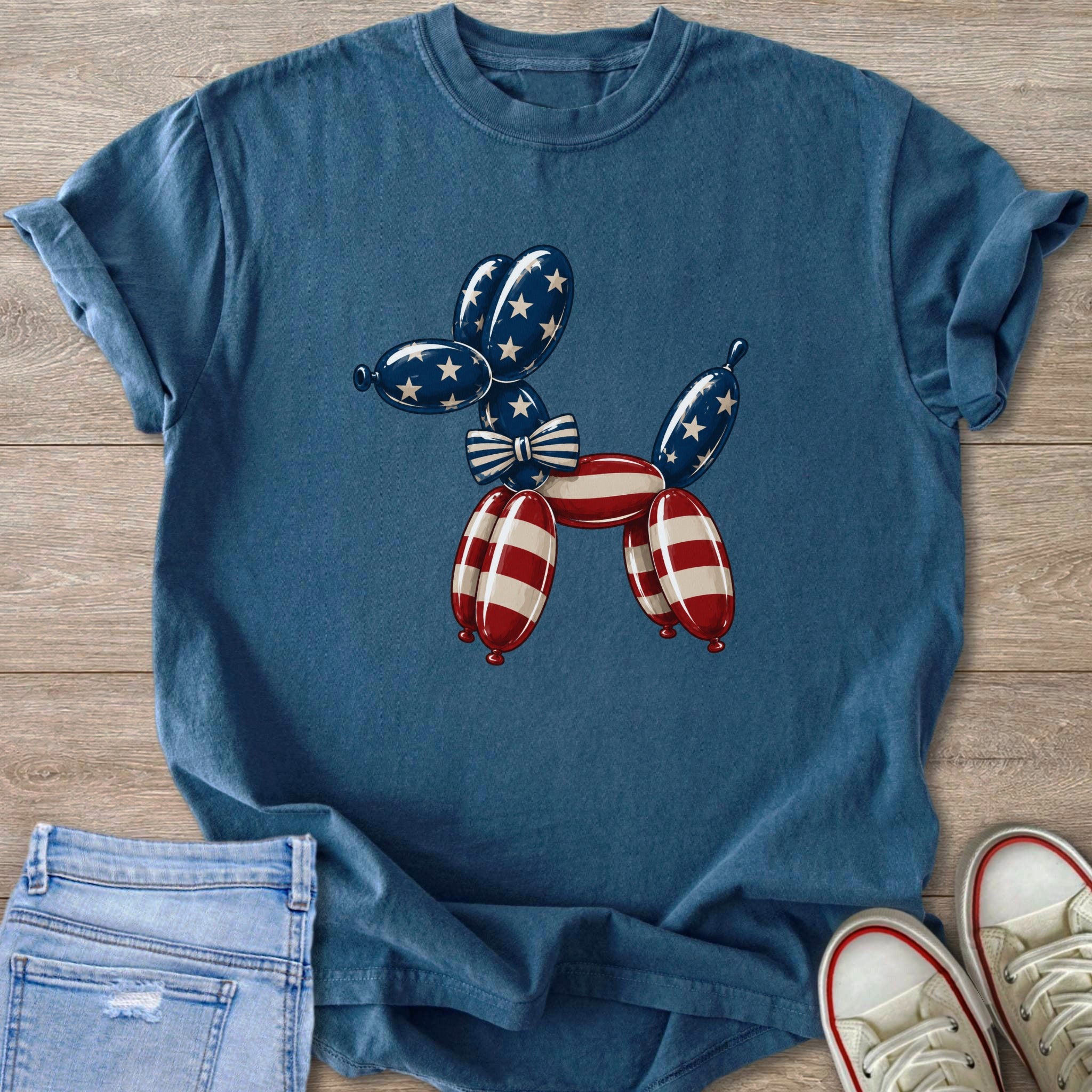 Blue t-shirt with a balloon dog graphic featuring American flag colors.