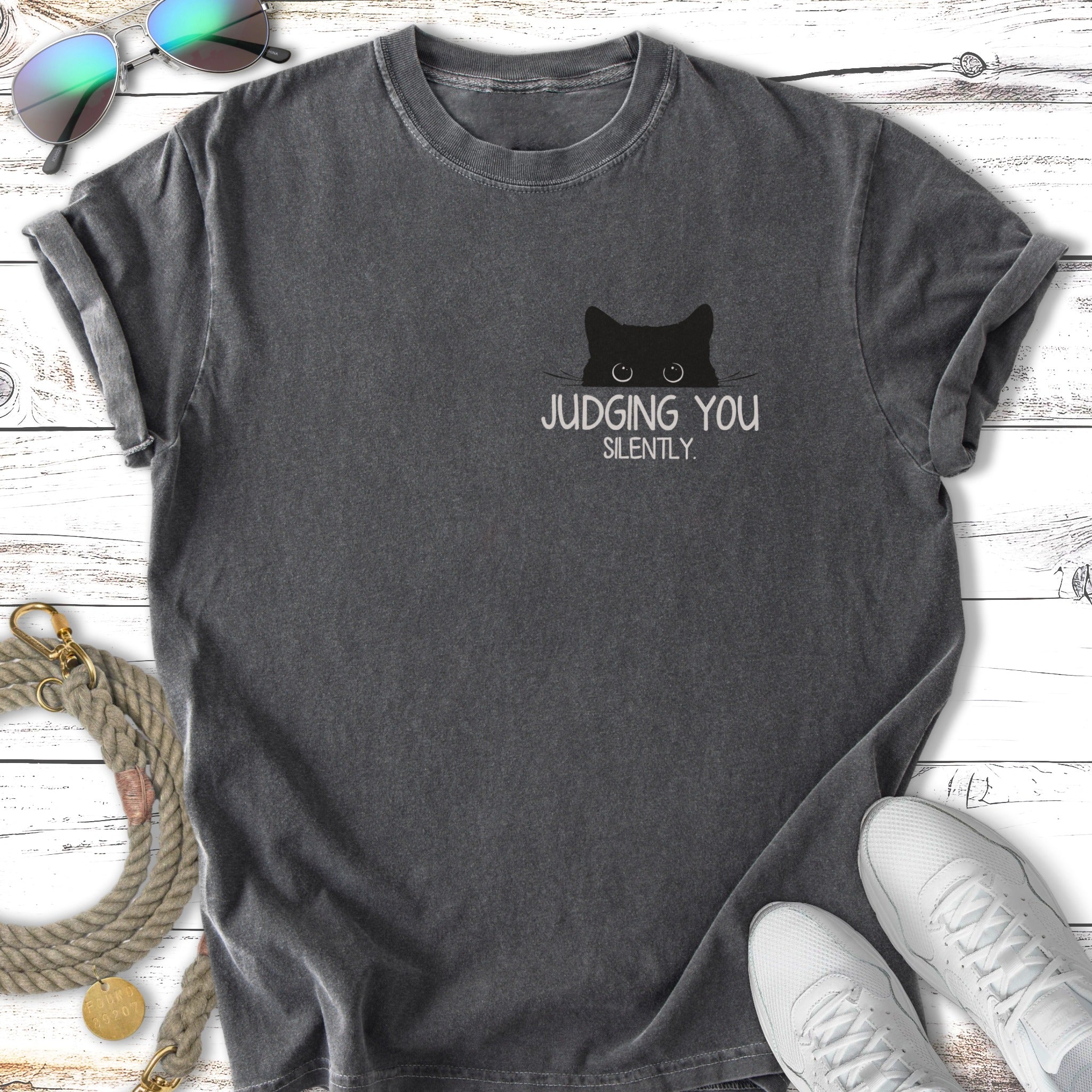 Black t-shirt with "JUDGING YOU SILENTLY." and a cat's eyes graphic.