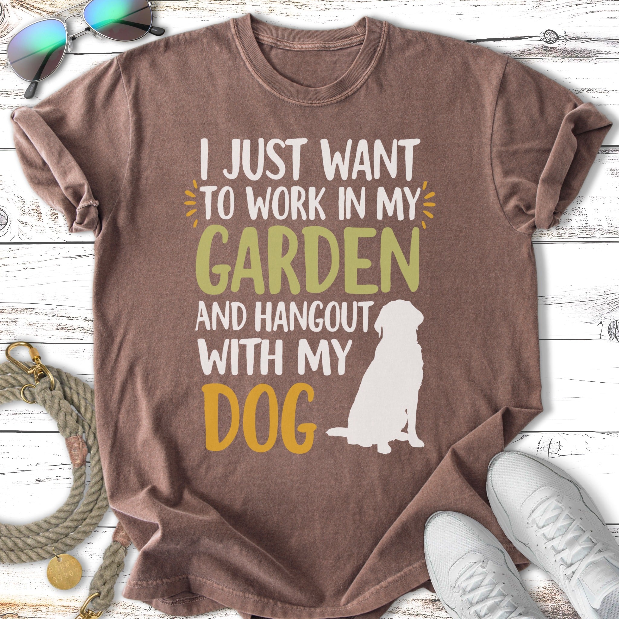 T-shirt with "I JUST WANT TO WORK IN MY GARDEN AND HANGOUT WITH MY DOG" and dog graphic.