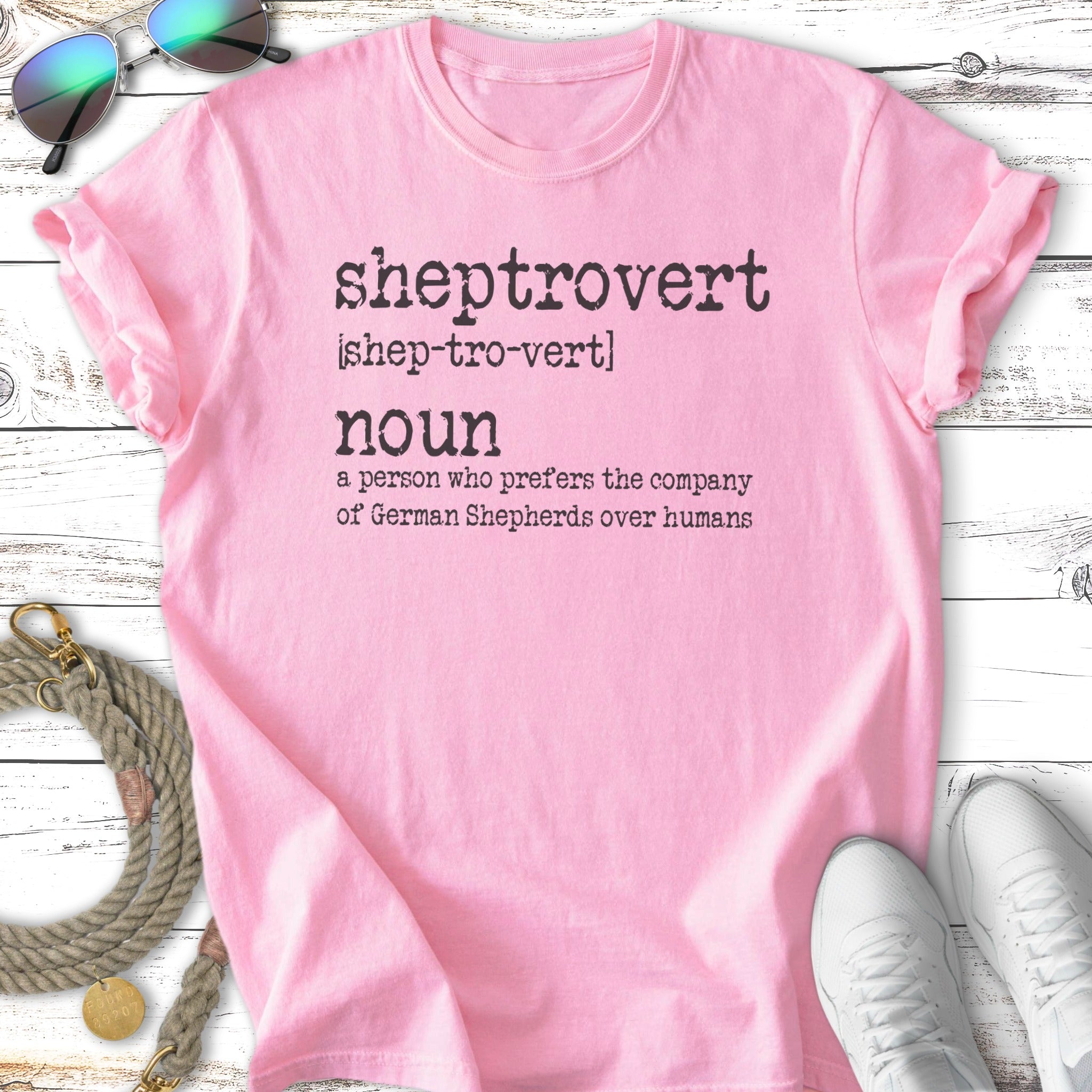 Pink t-shirt with "Sheptrovert" definition in black text.
