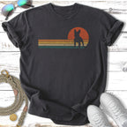 Dark t-shirt with vintage sunset graphic featuring a French Bulldog silhouette.