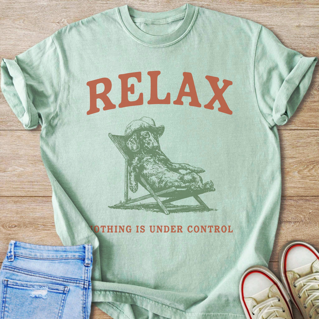 Green t-shirt with "RELAX" and a dachshund lounging in a chair.