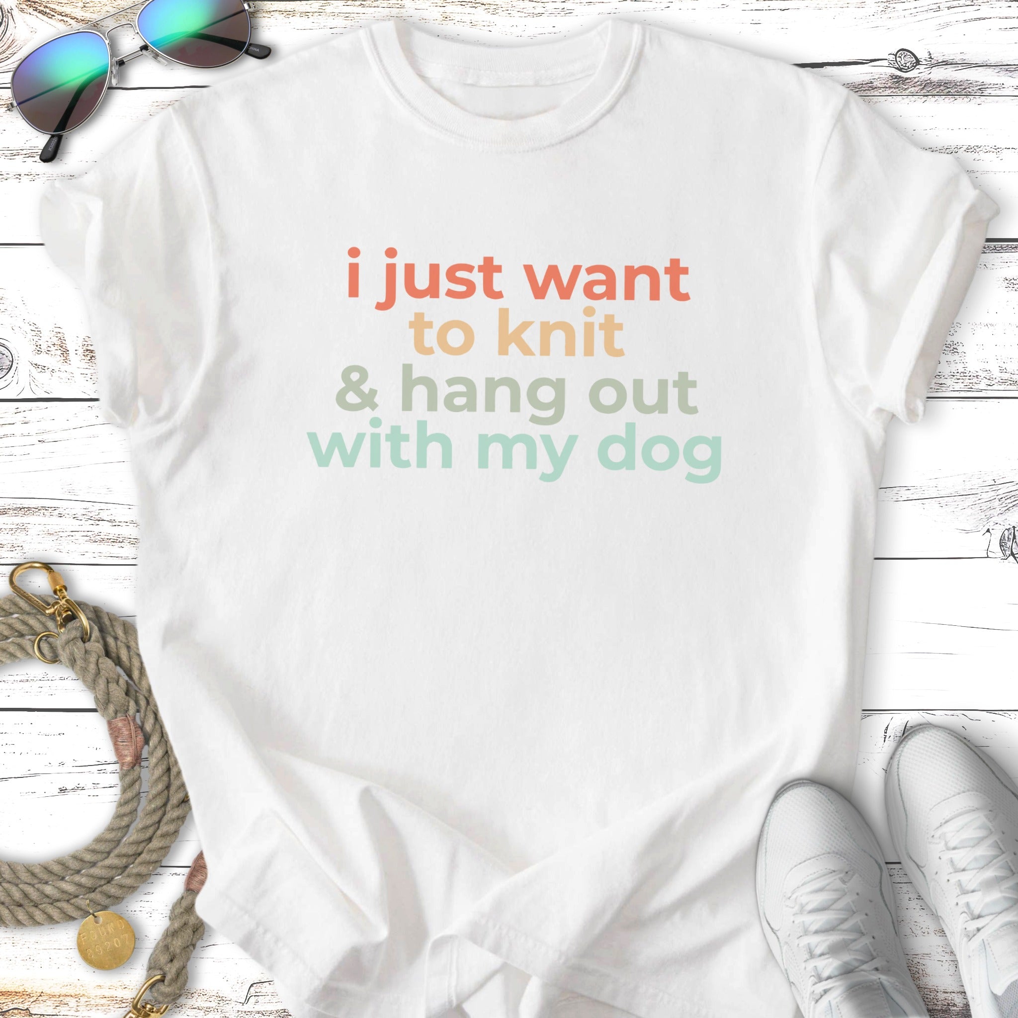 White t-shirt with "i just want to knit & hang out with my dog" text.