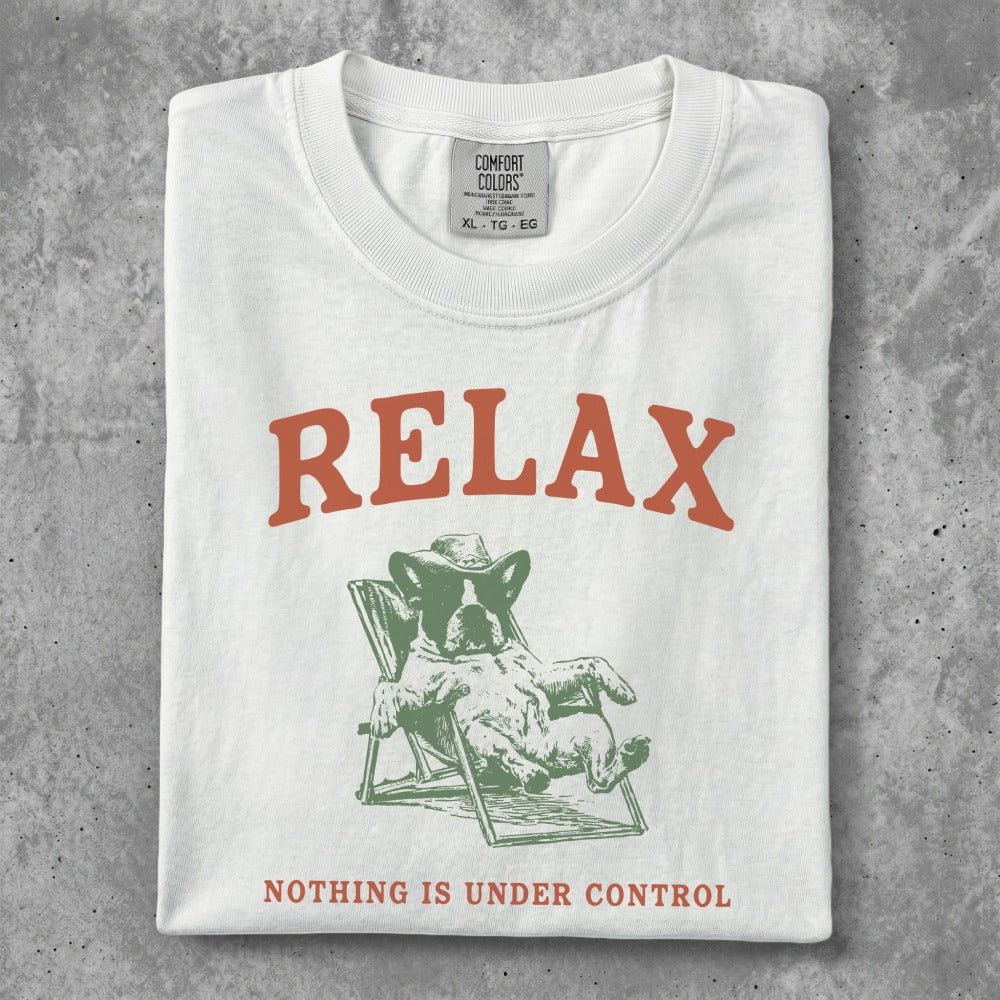 White t-shirt with "RELAX" and a dog in a lounge chair.