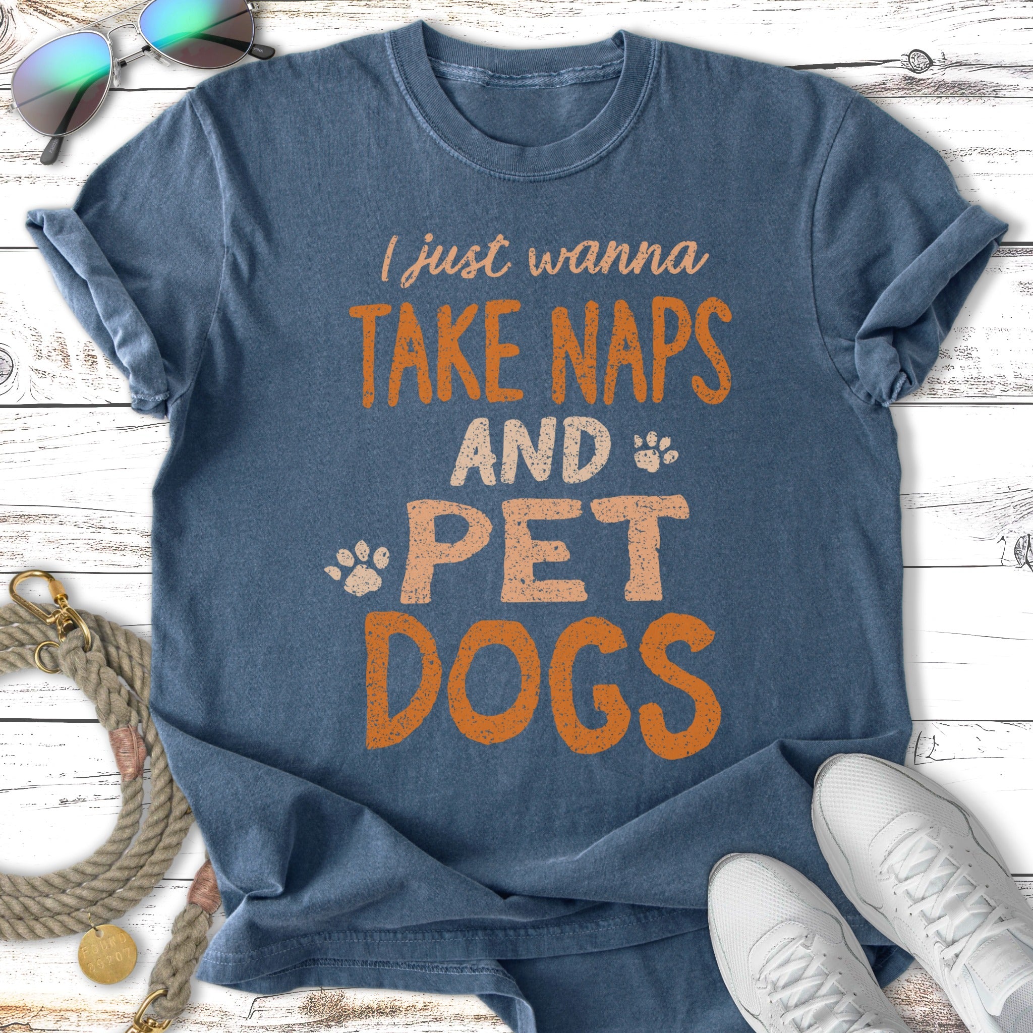 Blue t-shirt with text "I just wanna TAKE NAPS AND PET DOGS".