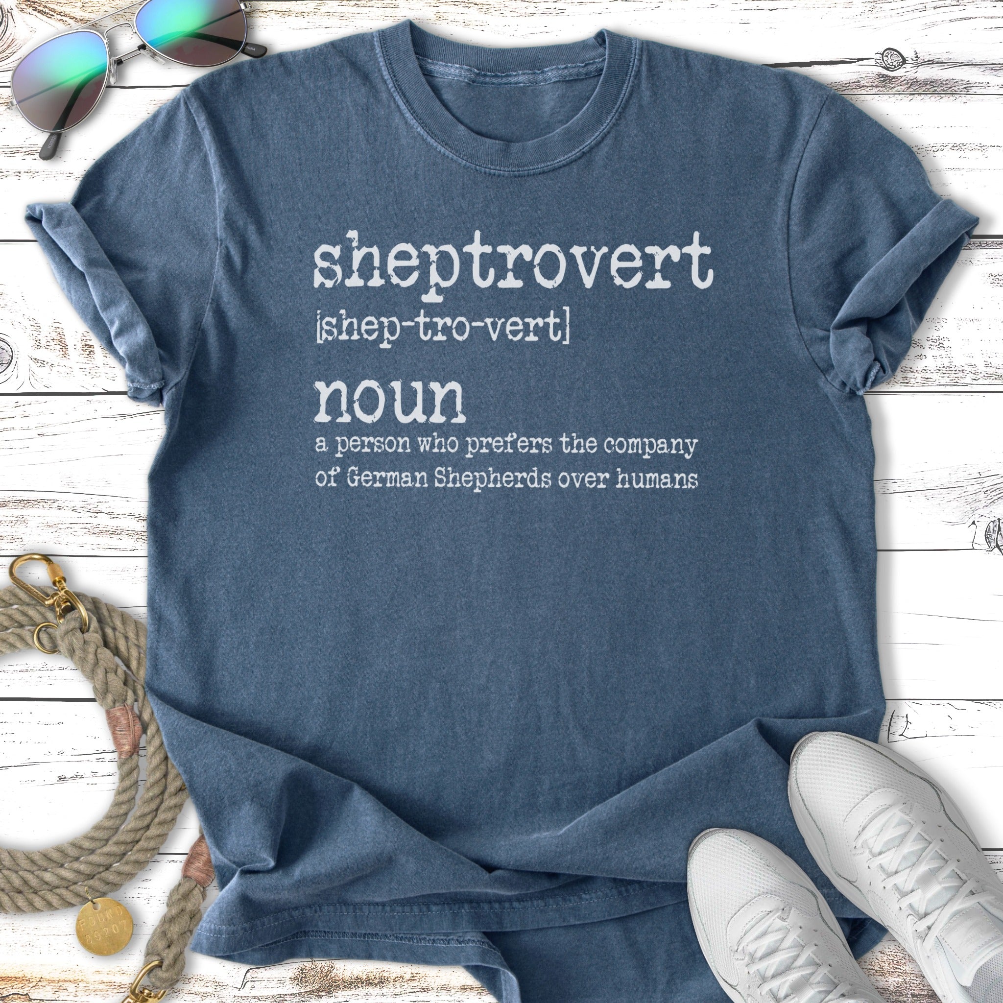 Blue t-shirt with "sheptrovert" definition about German Shepherds.