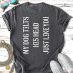 Dark gray t-shirt with "MY DOG TILTS HIS HEAD JUST LIKE YOU" text.