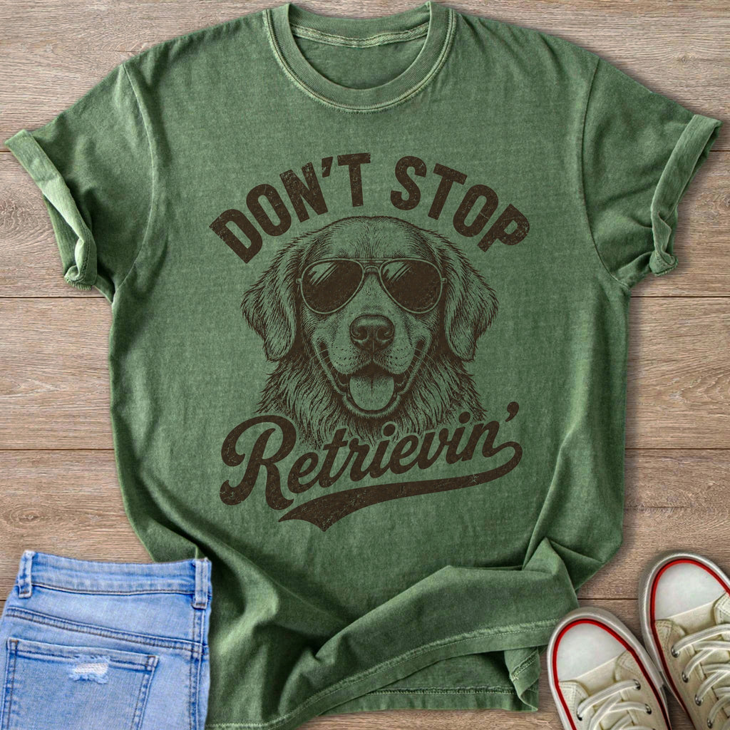 Green t-shirt with a golden retriever wearing sunglasses and text "Don't Stop Retrieving".