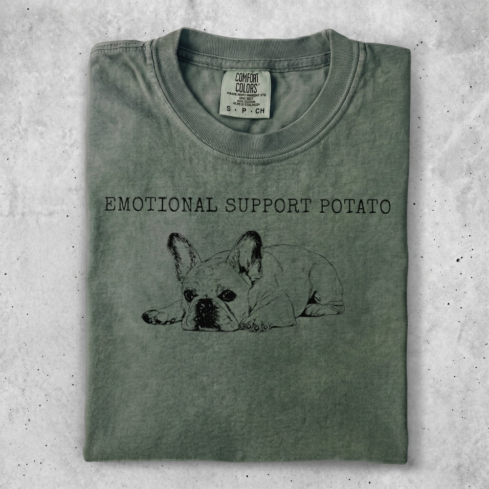 Green t-shirt with "EMOTIONAL SUPPORT POTATO" text and a French bulldog graphic.