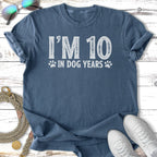 Blue t-shirt with "I'M 10 IN DOG YEARS" text.