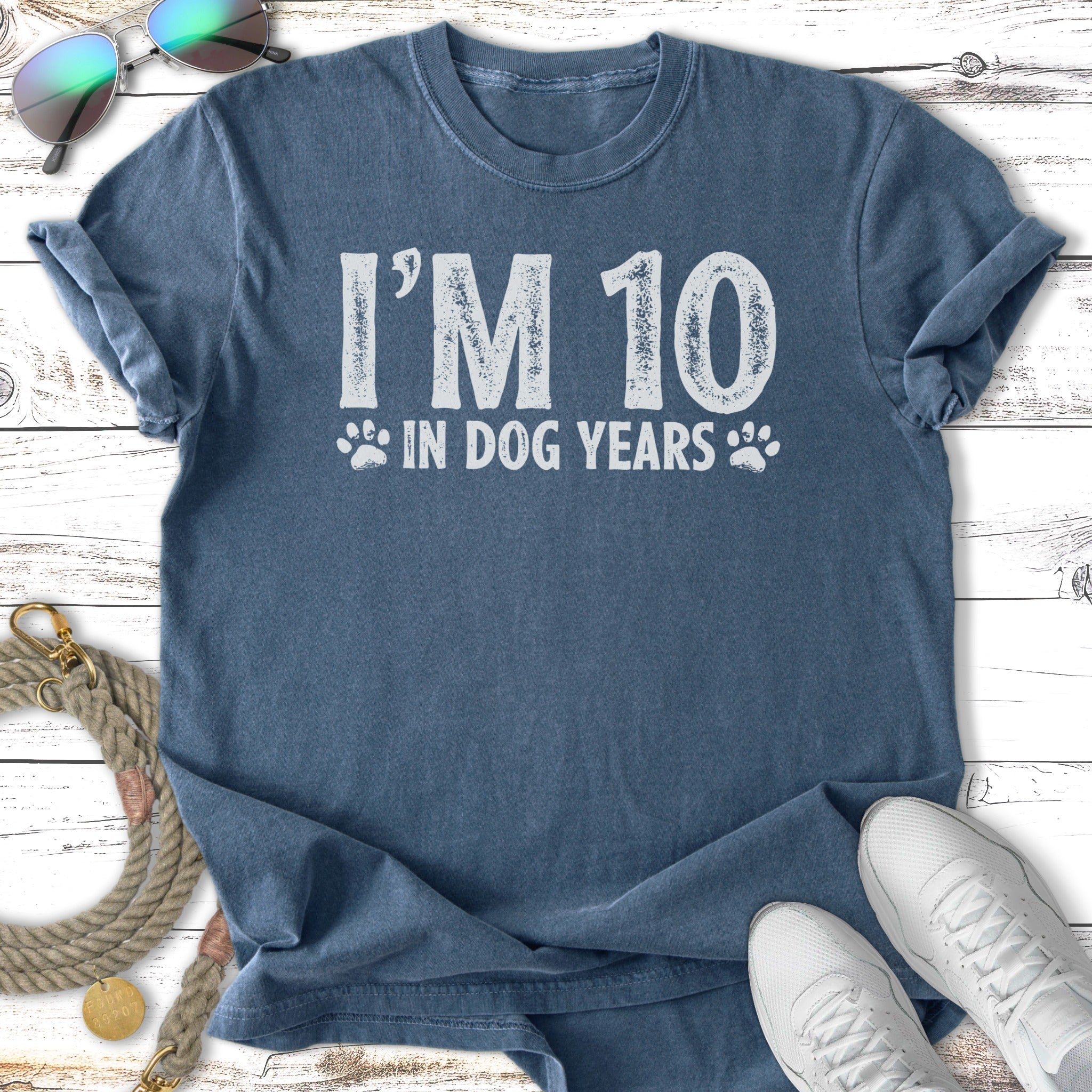 Blue t-shirt with "I'M 10 IN DOG YEARS" text.