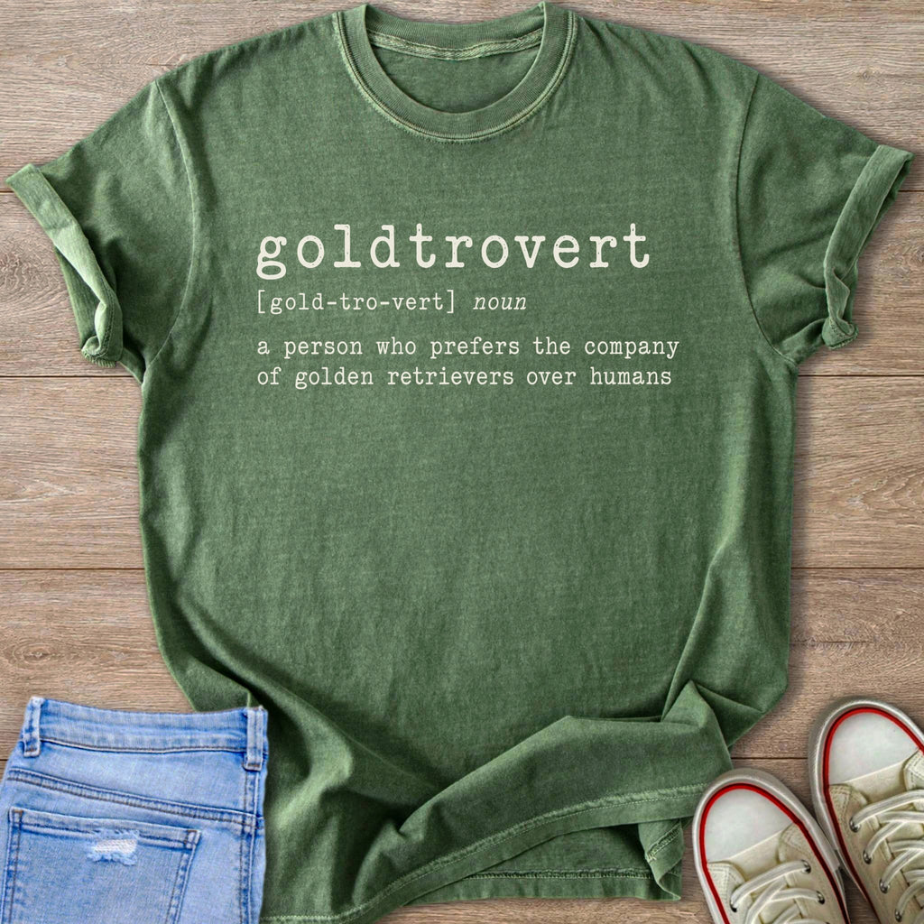 Green t-shirt with "goldtrovert noun a person who prefers the company of golden retrievers over humans" text.