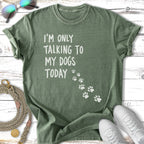 Green t-shirt with "I'm Only Talking To My Dogs Today" text and paw prints.
