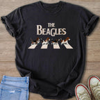 Dark t-shirt with "The Beagles" text and four beagles walking across a zebra crossing.