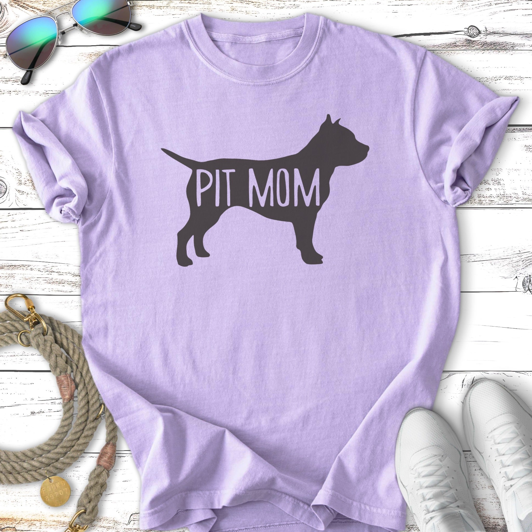 Purple t-shirt with black "PIT MOM" silhouette of a dog.