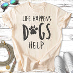 Light peach t-shirt with "Life Happens Dogs Help" text and paw print graphic.