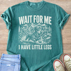 Teal t-shirt with graphic "WAIT FOR ME I HAVE LITTLE LEGS" and a dachshund.