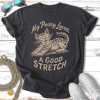T-shirt with a cartoon cat stretching and text "My pussy loves. A good stretch."