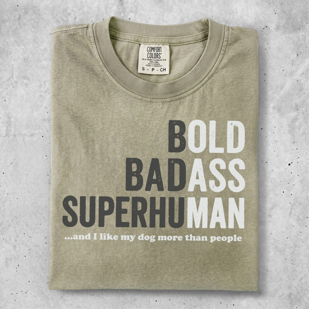 T-shirt with bold text "BOLD BADASS SUPERHUMAN" and smaller text.