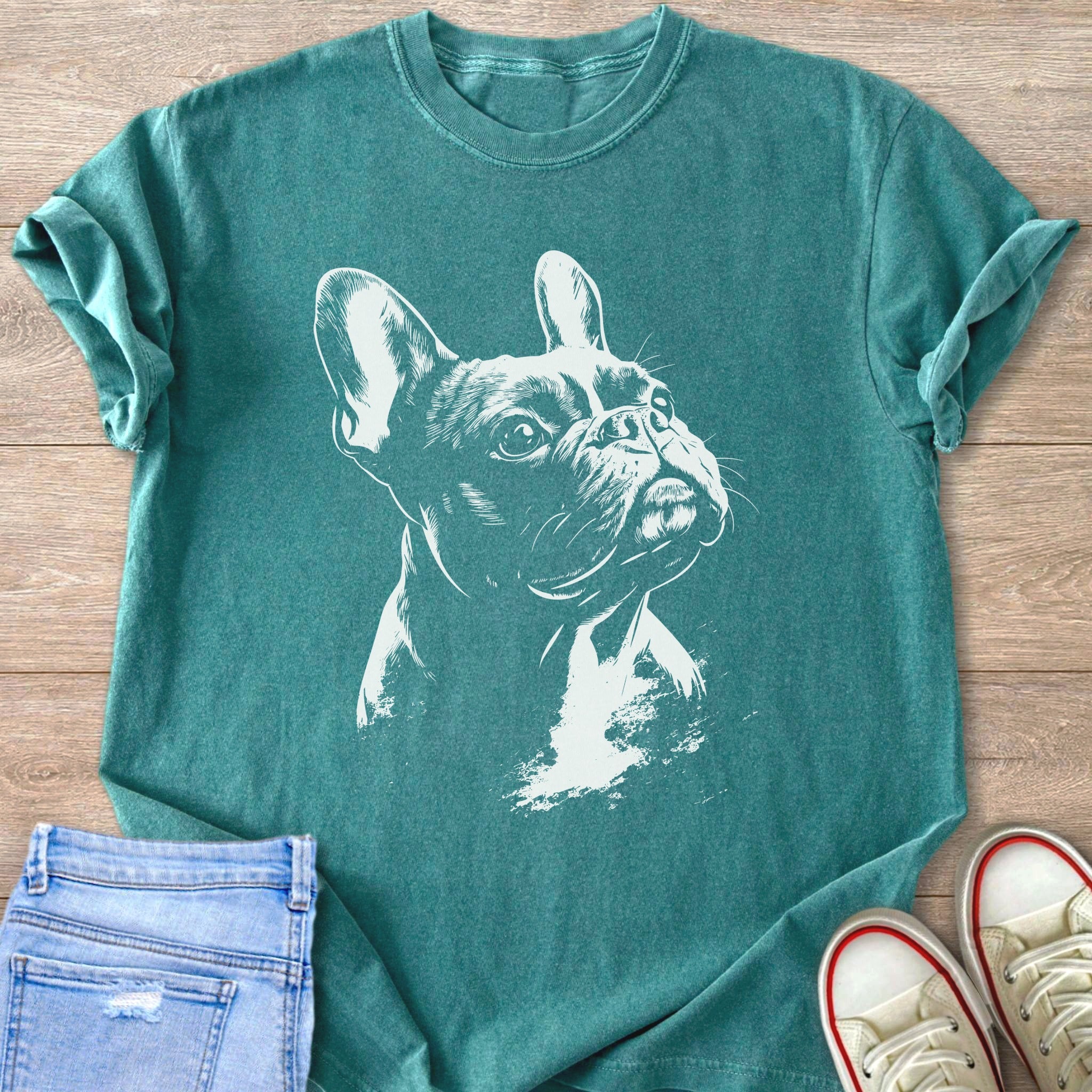 Teal t-shirt with white French Bulldog sketch and distressed denim shorts.
