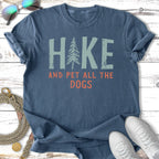 T-shirt with "Hike and Pet All the Dogs" text and a pine tree graphic.
