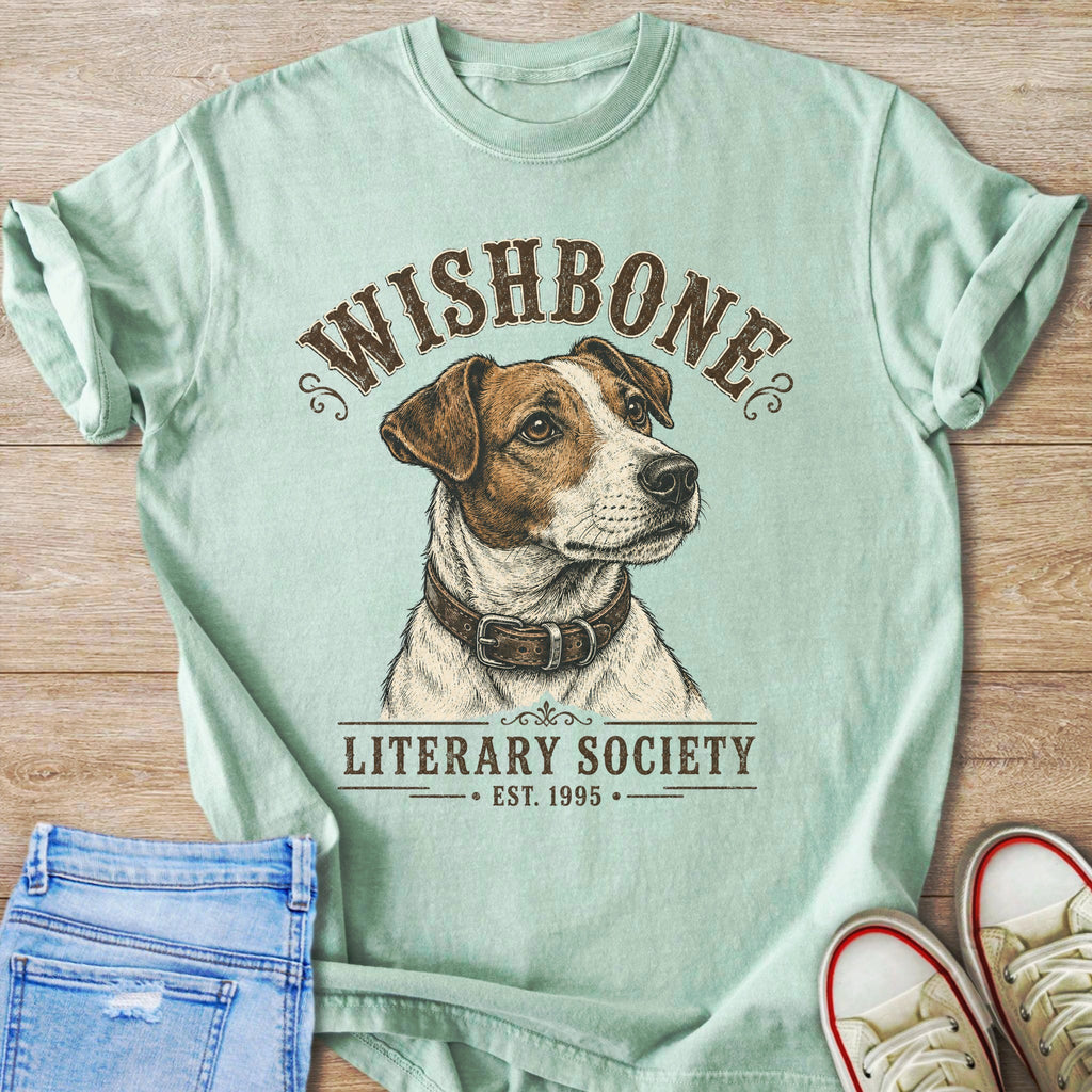 Light blue t-shirt with "WISHBONE LITERARY SOCIETY EST. 1995" and dog illustration.