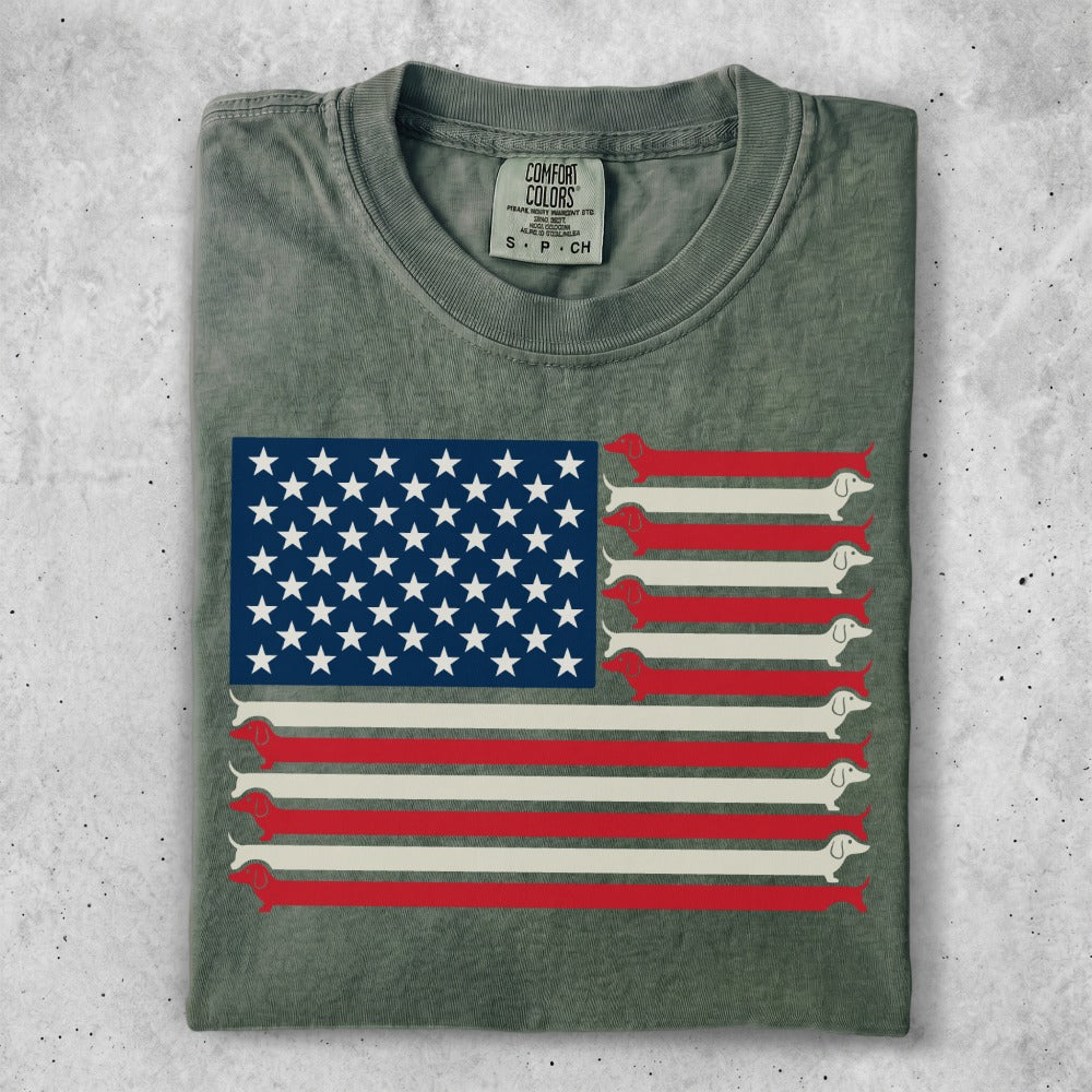 Green t-shirt with a patriotic dachshund flag design.