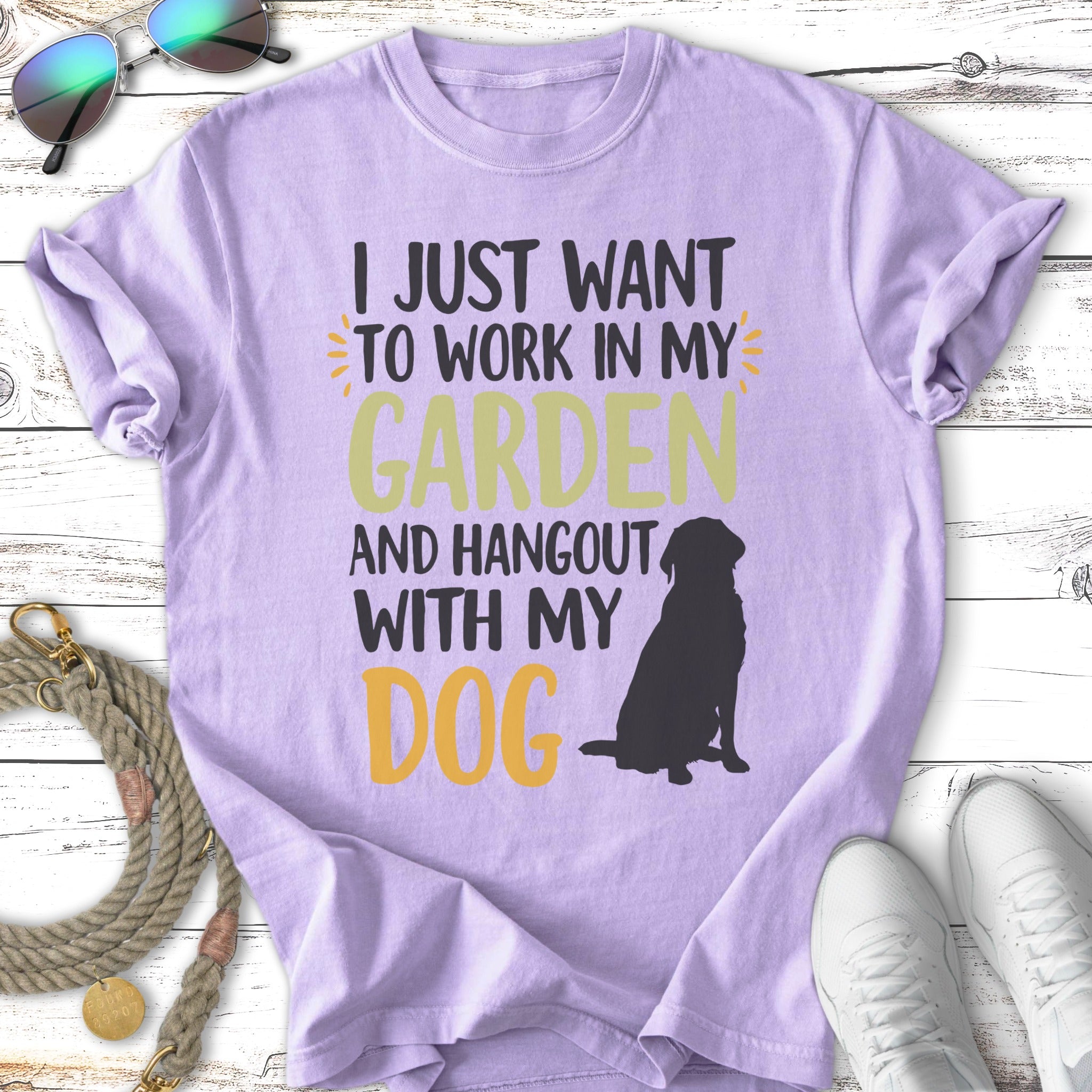 Purple t-shirt with text "I just want to work in my garden and hangout with my dog."