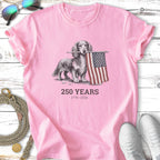 Pink t-shirt with drawing of dachshund holding US flag, "250 Years 1776-2026".