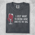 Charcoal t-shirt with graphic of wine glass and text "I JUST WANT TO DRINK WINE AND PET MY DOG".
