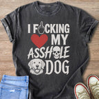 Dark t-shirt with white text and graphics about a dog.