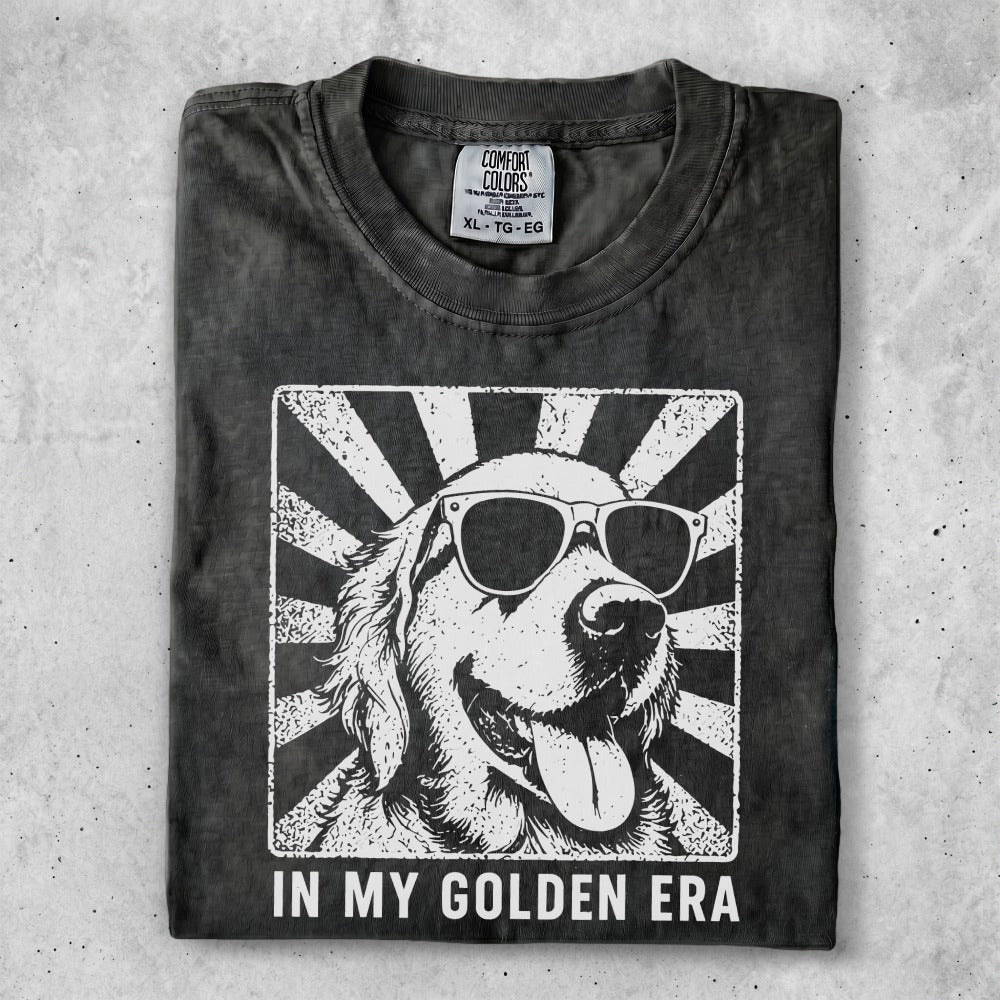 Black t-shirt with a graphic of a Golden Retriever wearing sunglasses.
