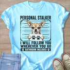 Light blue t-shirt with "Personal Stalker" and a chihuahua holding paw prints.