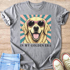 Gray t-shirt with smiling golden retriever wearing sunglasses and text "IN MY GOLDEN ERA".