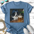 Border collie wearing a baseball cap, drinking beer from a mug.