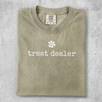 Comfort Colors t-shirt with "treat dealer" and paw print graphic.