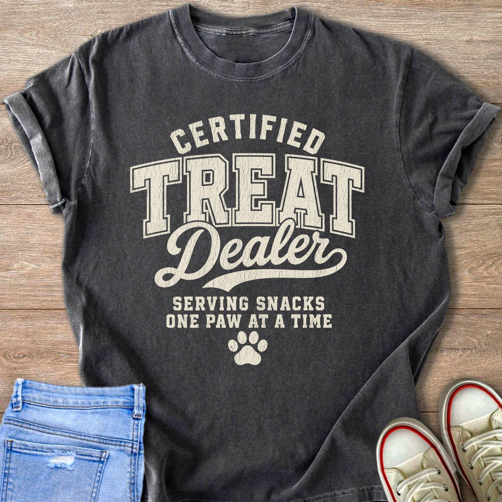 Dark grey t-shirt with "CERTIFIED TREAT DEALER" and paw print graphic.